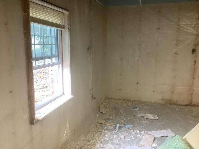 Water Damaged, Unsealed Basement Walls