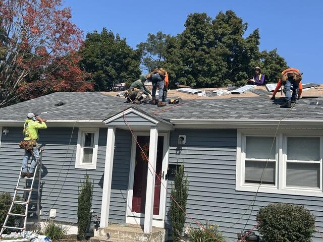 New Shingles Are Put On