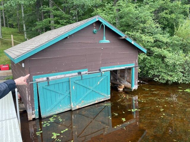 Before - Unstable and Tilting Boathouse
