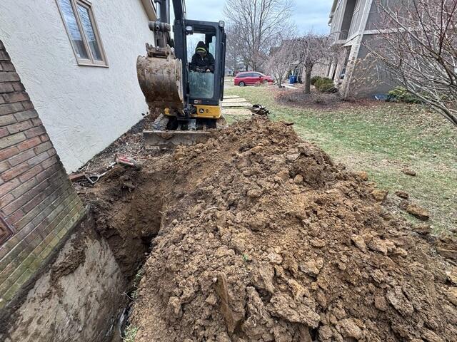 Helical Pier Installation - Drilling into Stable Soil