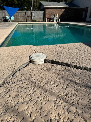 Severely Cracked and Sinking Concrete