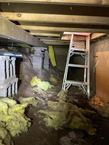 Exposed and Unstable Crawl Space Near Entry in Hawthorne, WI