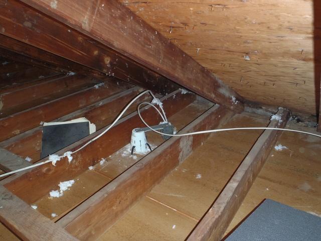 <p>The old insulation has been removed from the attic floor. </p>