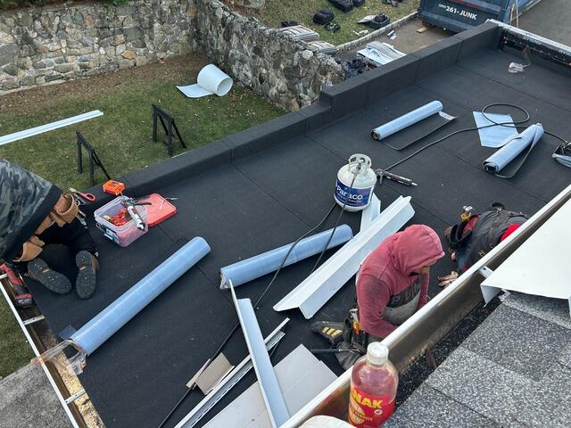 Flat Roof Cap Is Installed