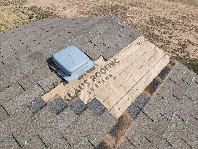 Removal of loose and damaged shingles.