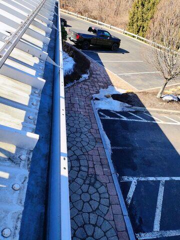 Downspouts cleared, no more standing water