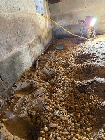 Dirt and Stone Crawlspace Floor