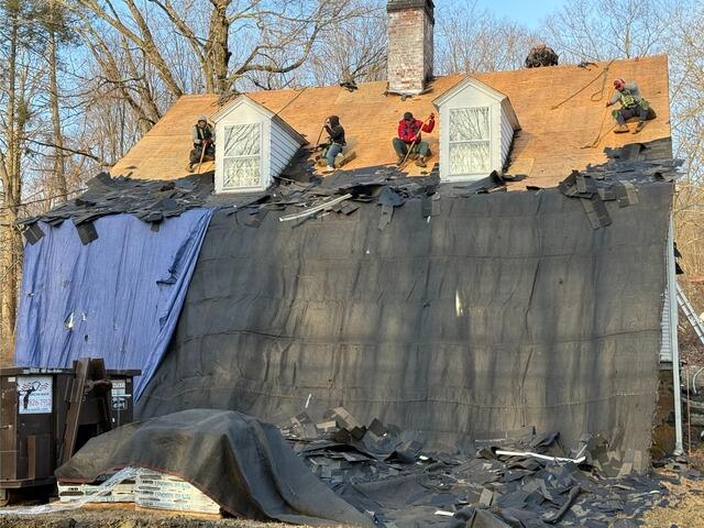 Old Shingles Come Off & Decking Is Exposed