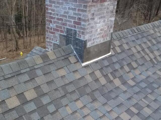 New Flashing Is Installed on Chimney