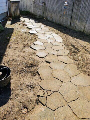 Stone walkway before cleaning