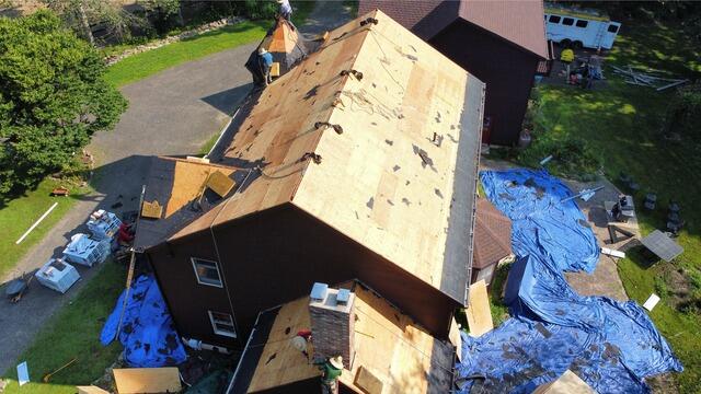 Old Shingles Come Off & Decking Is Exposed