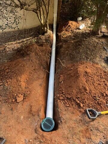 Downspout Extensions before covered.