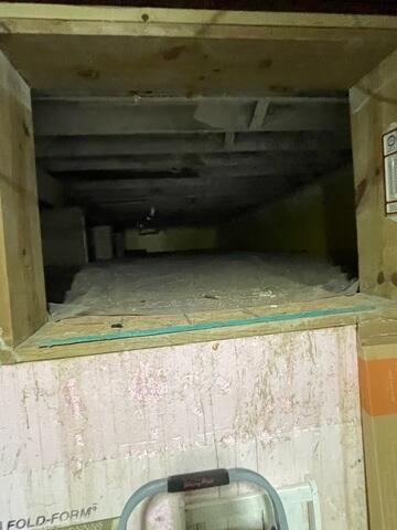 Before: Entrance to Damp Crawlspace