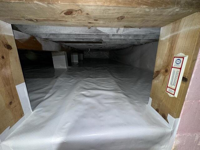 After: Sealed and Clean Crawlspace Entrance