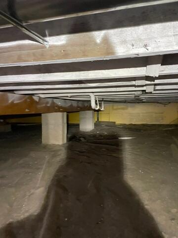 Before: Exposed Floor in Crawlspace