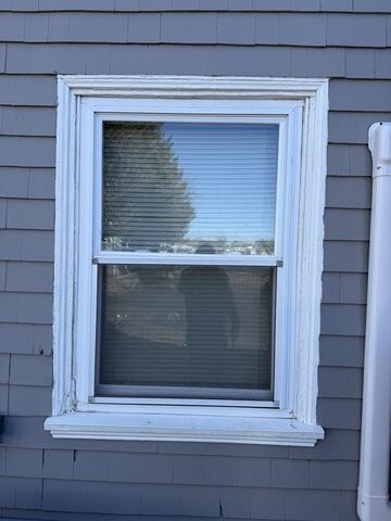 Window Trim and Siding Before Painting