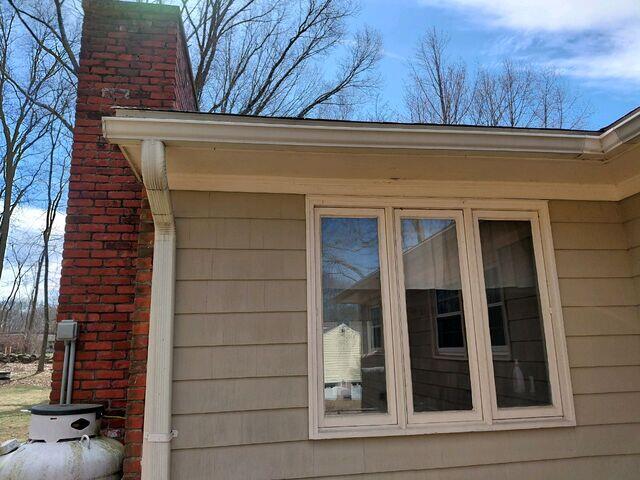 Gutters after cleaning and brightening