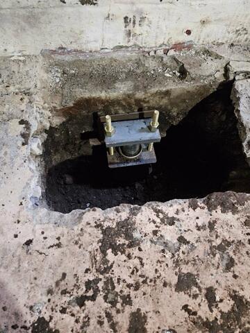 Installing Push Pier Under Slab in Duluth, MN