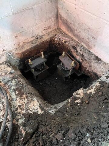 Push Piers Installed in Corner for Foundation Support