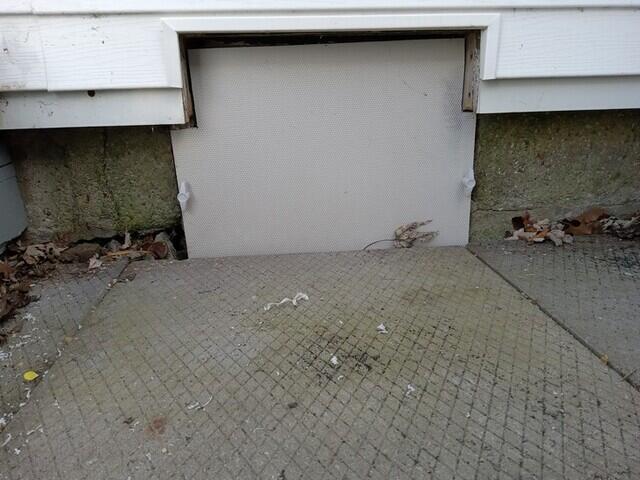 Insulated crawlspace door