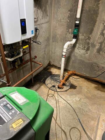 Old Sump and Still a Wet Basement