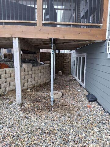 After: Stabilized Porch with New Beam and Piers in Place