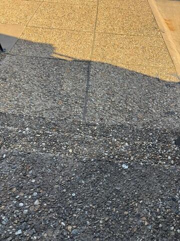 Severe Concrete Sinking and Surface Degradation