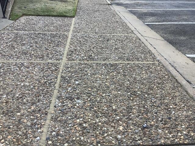 Re-leveled Concrete Transition Near Parking Area