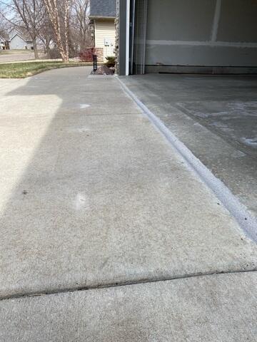 Separation between garage and driveway sealed
