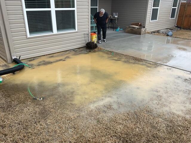 Severe Backyard Flooding Threatens Patio and Foundation
