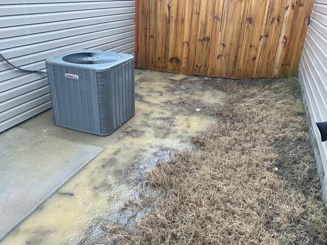 Side Yard Flooding Endangers HVAC and Home Structure