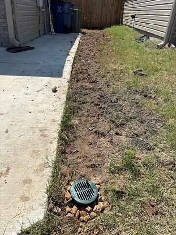Installed Catch Basin Solves Drainage at Foundation Edge
