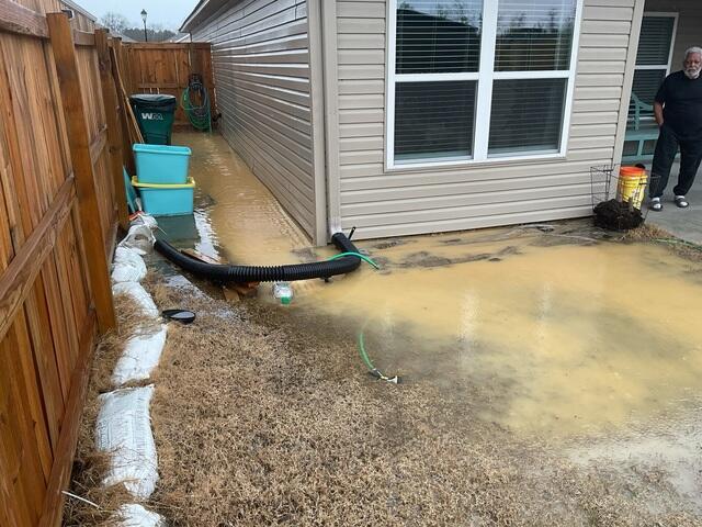 Flooded Yard Before Drainage System Was Installed