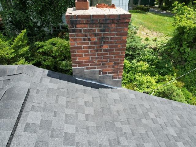 New Flashing Is Installed on the Chimney