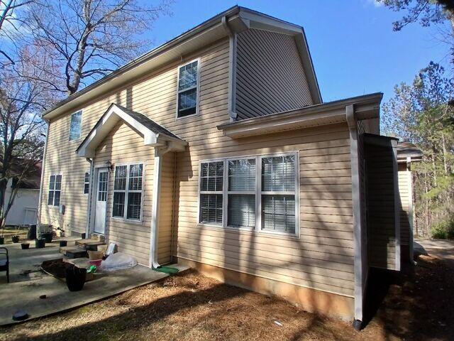 Before: Gutters filled with leaves and debris