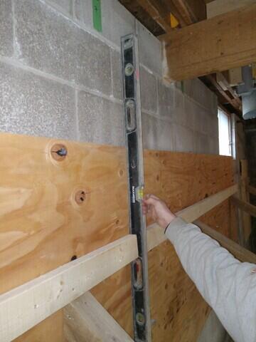 Wall straightened