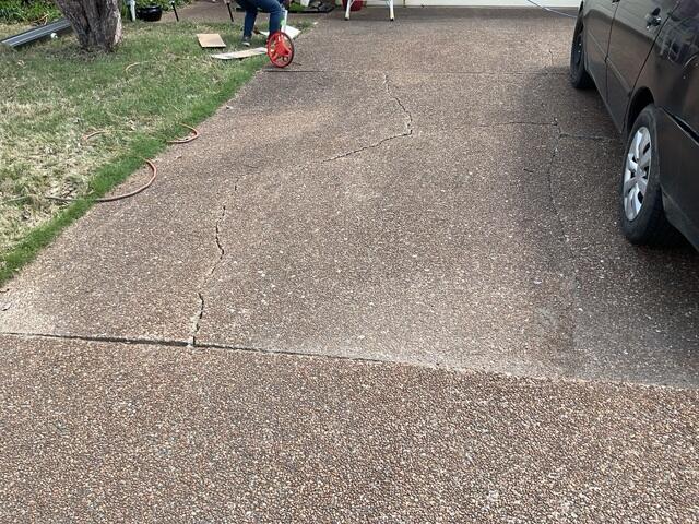 Cracked and Sinking Concrete Driveway