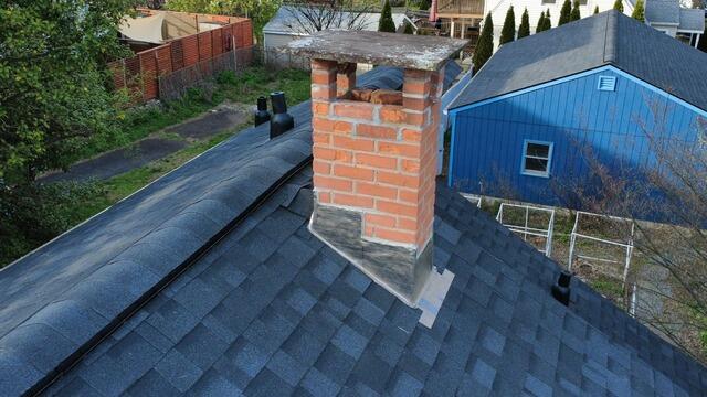 New Flashing Is Installed on the Chimney