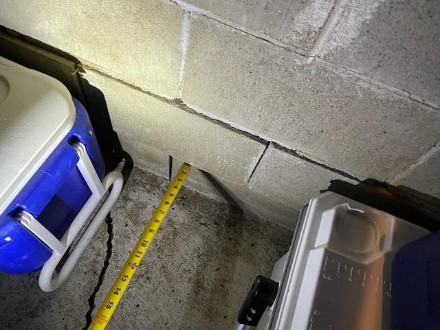 Visible Foundation Cracks and Inward Wall Movement