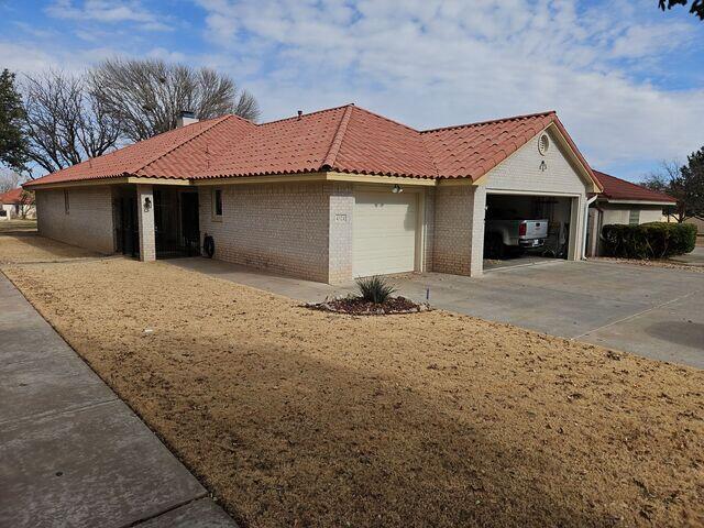Home in Lubbock, Tx with damage to tile roof.