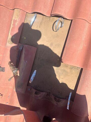 Removal of broken Tile.