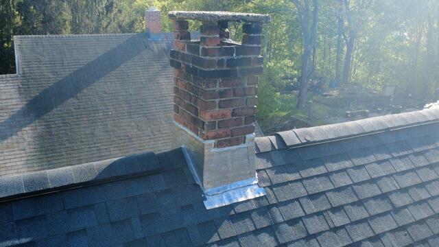 New Flashing Is Installed on the Chimney