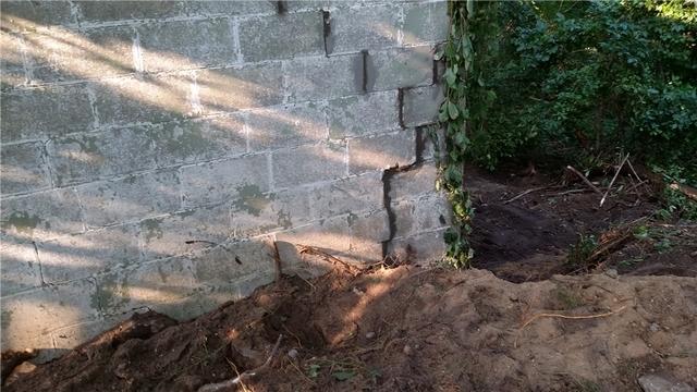 Front View of Stair Step Crack in Foundation