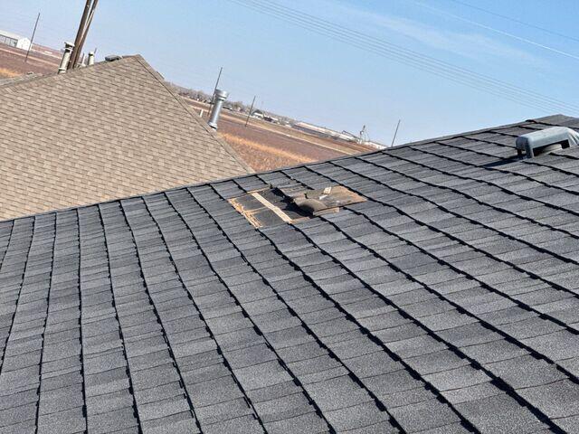 Wind Damage to Shingles.