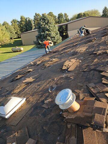 Removing all old shingles.