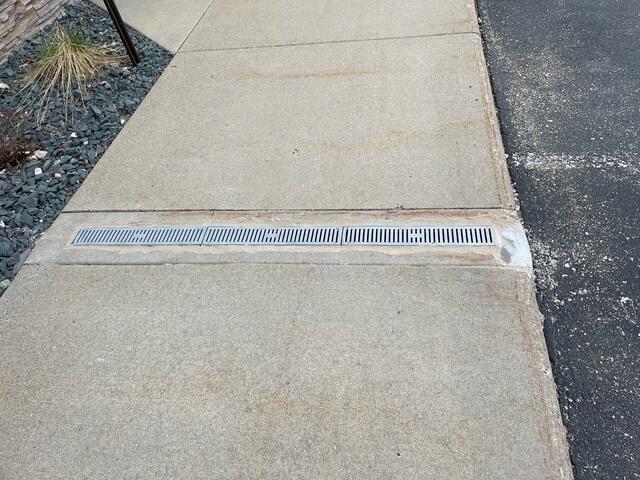 Downspout Drain Protected from Water Intrusion
