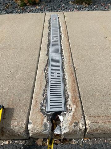 Erosion at Buried Downspout Connection