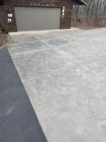 Smooth, Repaired Driveway Improves Entryway