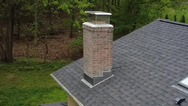 New Flashing Is Installed on the Chimney