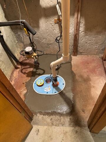 Sump Pump Cemented into Foundation